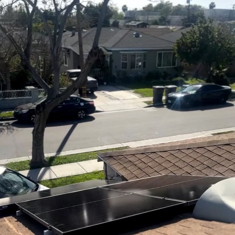 Solar panel installation overlooking neighborhood